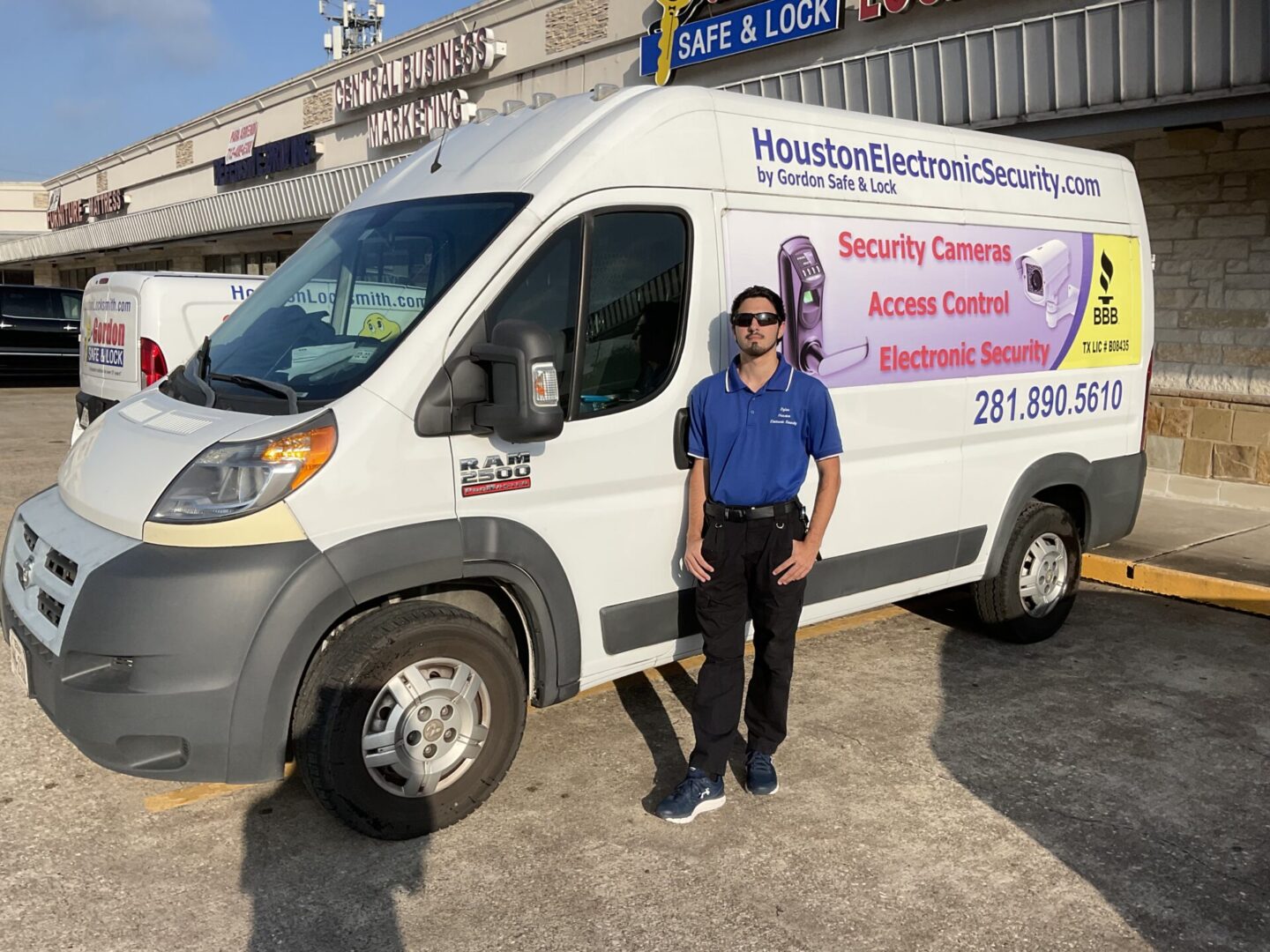 A man standing in front of a van.